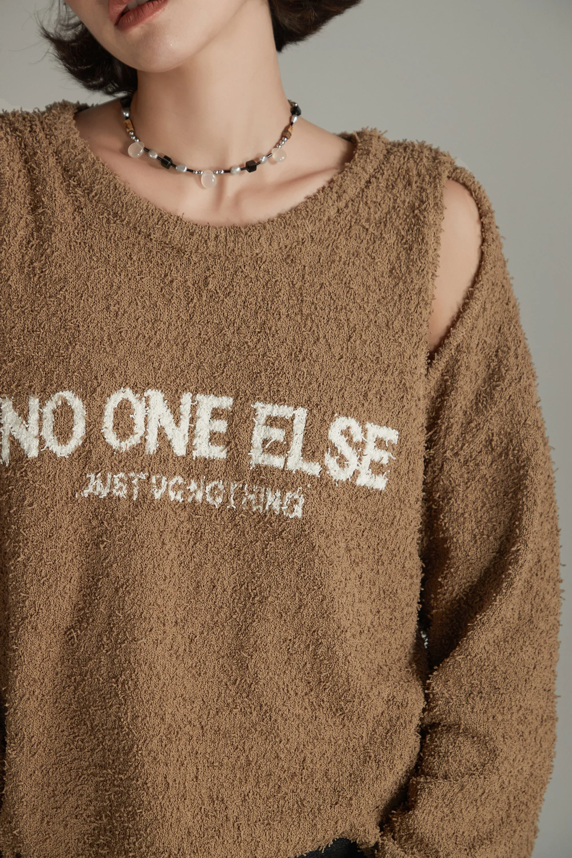 Logo Shoulder Split Loose Knit Sweater